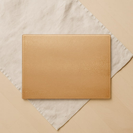 warm sand – textured glass cutting board